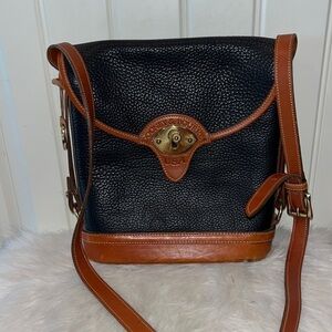 VINTAGE classic black pebbled leather Dooney Bourke Calvary spectator bag large